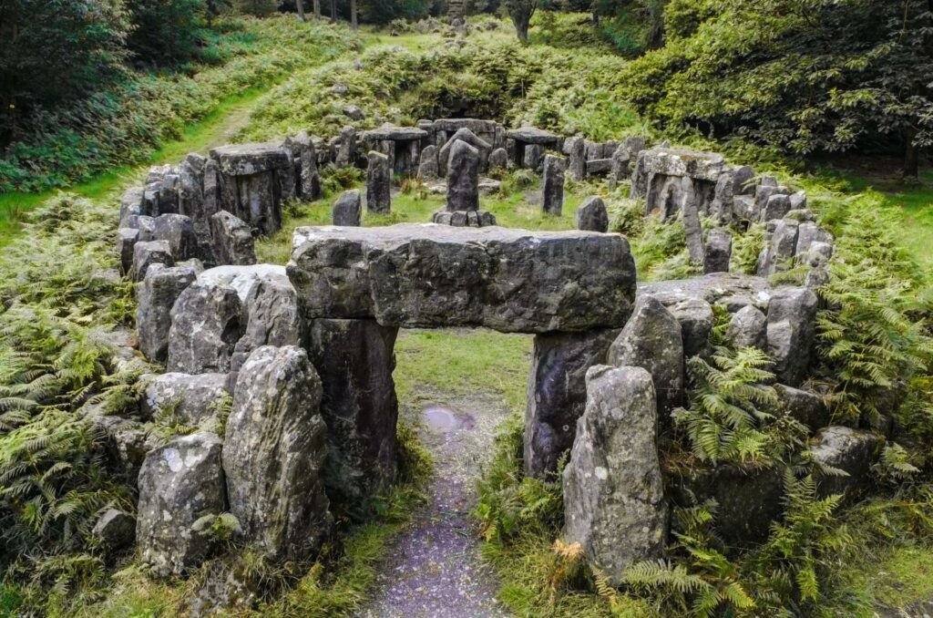 A stone circle temple in the English forest.