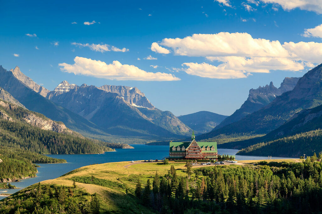 The historic and cozy looking Prince of Wales Hotel stands on a bluff overlooking Upper Waterton Lake.